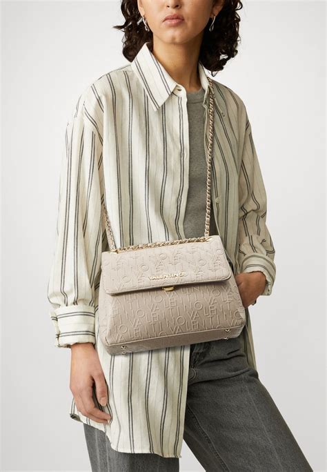 fake valentino crossbody bag|valentino crossbody bag beige.